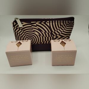 (2)Charlotte Tilbury Magic Cream Instant Turnaround Moisturiser & A Makeup Pouch